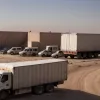 Гуманитарная помощь начала поступать в Сектор Газа после дней задержек
